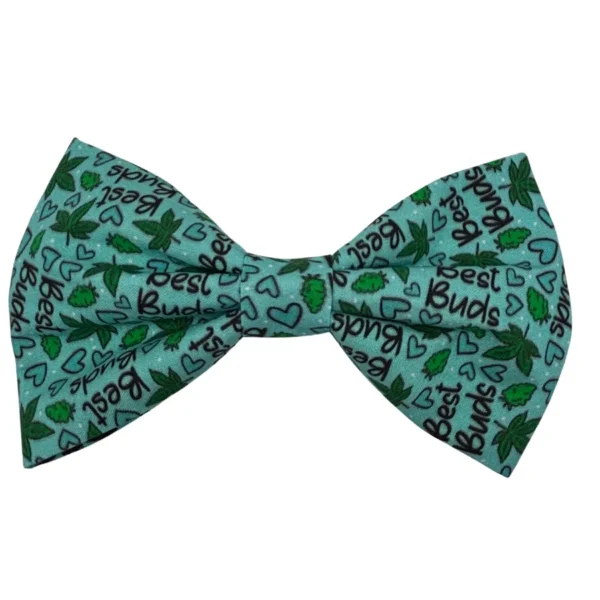 The 420 Best Buds Blue Dog Bowtie features a teal backdrop with dark green cannabis leaves, small hearts, and Best Buds in black script—ideal for those who love a playful and unique style.