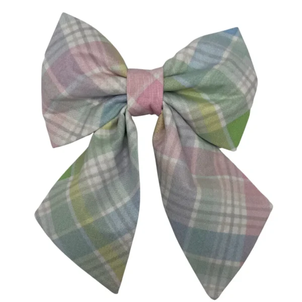 The Easter Elegance Plaid Sailor Pet Bowtie showcases a large fabric bow with a pastel plaid pattern in pink, blue, green, and white. Its two loops and long tails accentuate the checkered design.