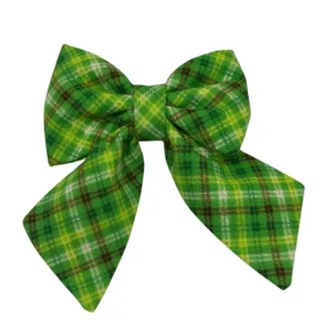 The Irish Plaid Sailor Bowtie for Little Dogs and Cats features a large crisscross pattern in green, yellow, and brown. Symmetrically designed with two loops and two tails, its perfect for enhancing the charm of small pets.